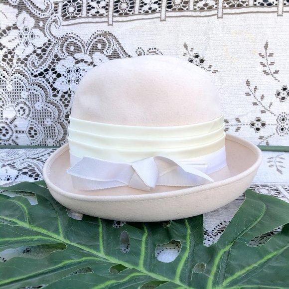 cream bowler hat